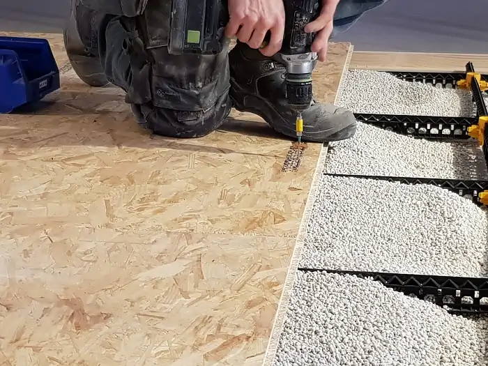 Load-bearing dry filler floor construction