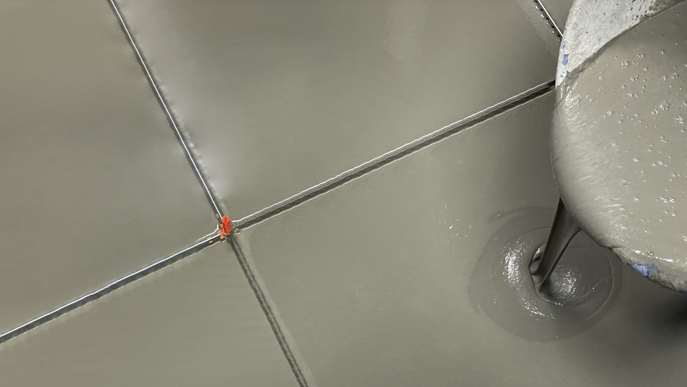 Leveling compound on existing tiles