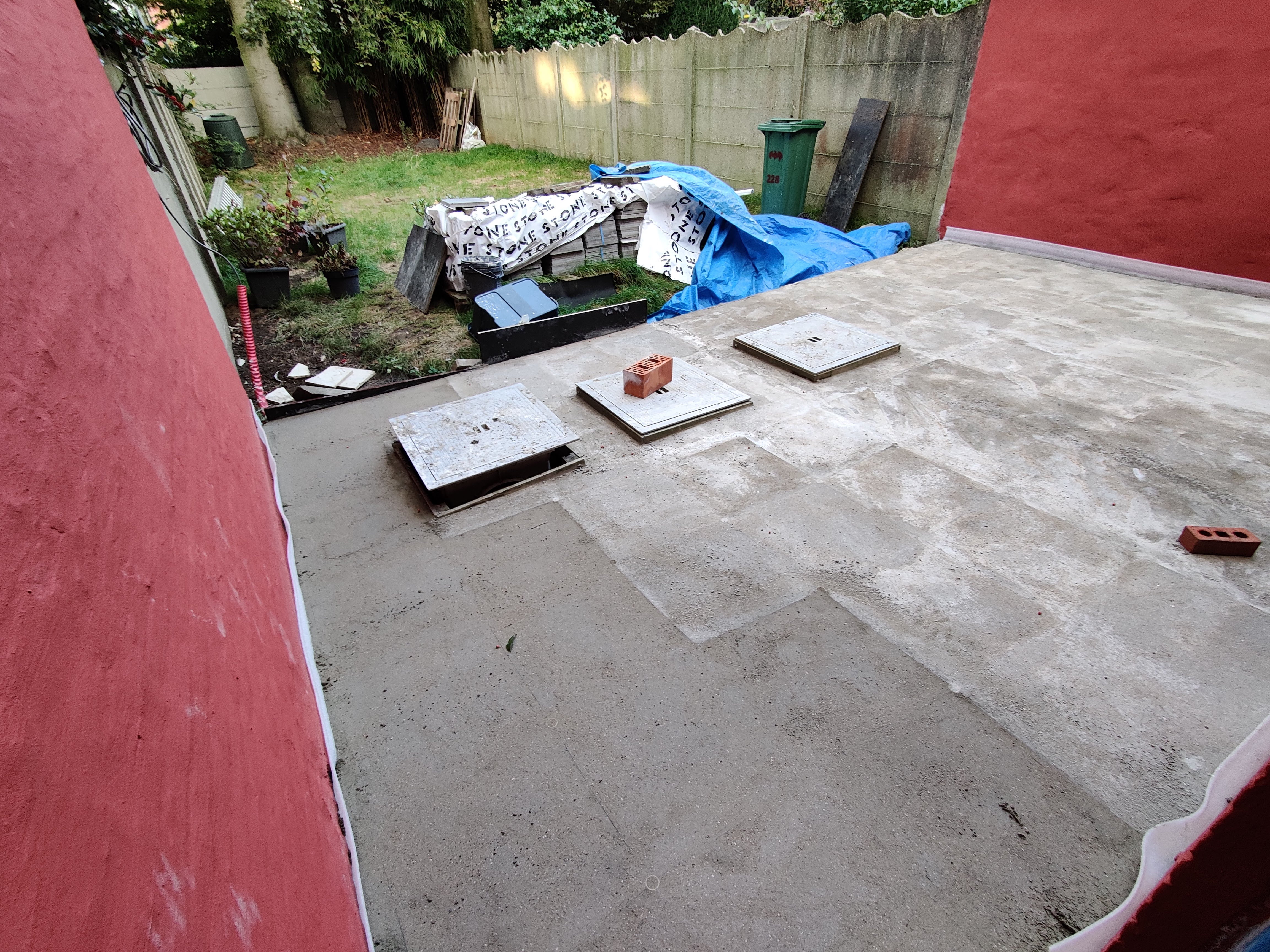 Terrace on sloping concrete slab with gutter