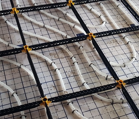 Combining underfloor heating with Staenis grid