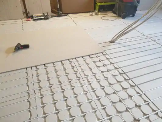 Staenisrooster circulaire droogvloer met cellentbeton van Chapyt en isolatie van Unilin