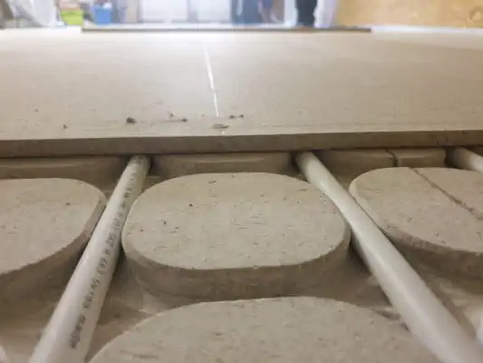 Staenisrooster circulaire droogvloer met cellentbeton van Chapyt en isolatie van Unilin