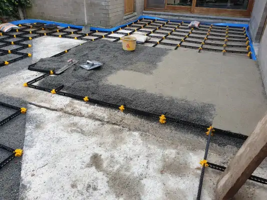 Staenisrooster drainerende terras vloeropbouw op beton ondergrond