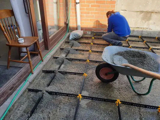Staenisrooster terrasvloer op beton