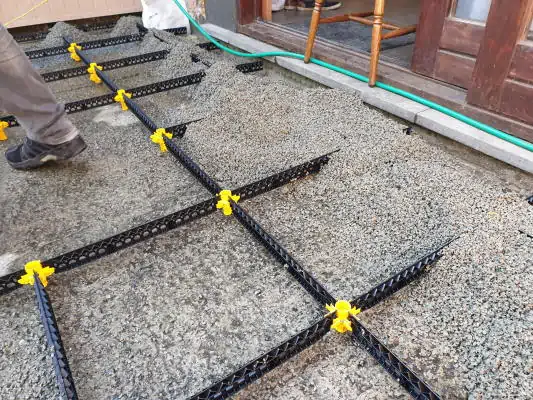 Staenisrooster terrasvloer op beton