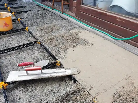 Staenisrooster terrasvloer op beton